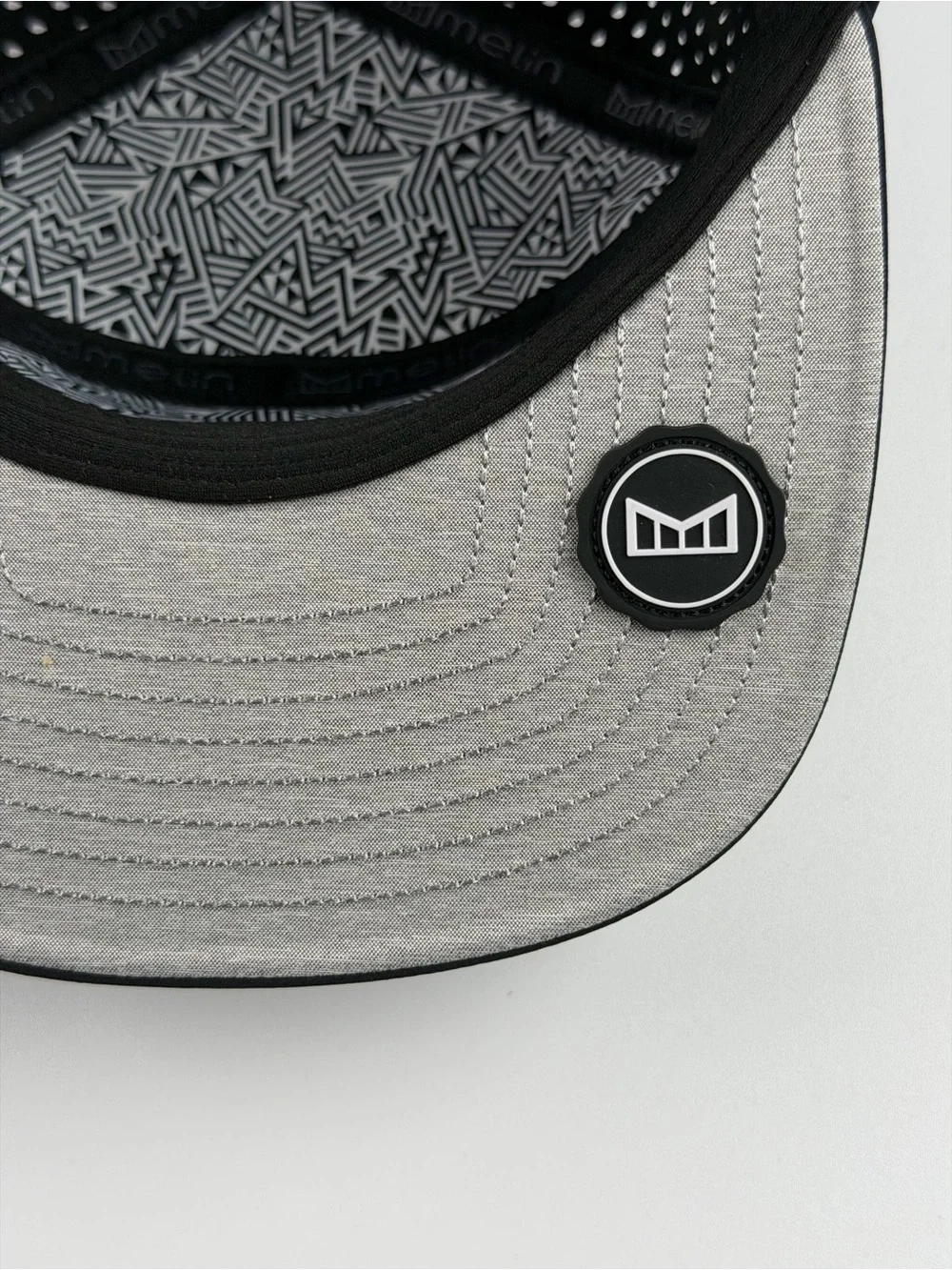 Melin Trenches Icon Hydro Performance Snapback Hat in Black, Classic